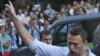 FILE - In this file photo taken on Friday, Aug. 17, 2012, Russian protest leader Alexei Navalny gestures as he walks outside a court in Moscow, Russia. 