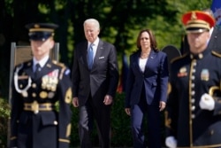 U.S. President Joe Biden arrives with Vice President Kamala Harris to place a wreath at the Tomb of the Unknown Soldier at Arlington National Cemetery, on Memorial Day, in Arlington, Virginia, May 31, 2021.