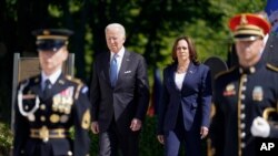 President Joe Biden arrives with Vice President Kamala Harris to place a wreath at the Tomb of the Unknown Soldier at Arlington National Cemetery on Memorial Day, May 31, 2021, in Arlington, Va.