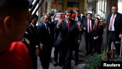 Venezuela's re-elected President Nicolas Maduro gestures after receiving a certificate confirming him as winner of Sunday's election, at the National Electoral Council (CNE) in Caracas, May 22, 2018. 