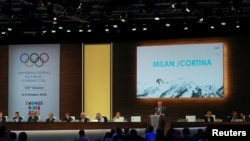Juan Antonio Samaranch Jr, Vice-President of the International Olympic Committee (IOC), speaks as he presents Milan / Cortina as a candidate to host the 2026 Winter Olympics during the 133rd IOC session in Buenos Aires, Oct. 9, 2018.
