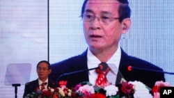 FILE - Myanmar's President Win Myint speaks at a summit in Kathmandu, Nepal, Aug. 30, 2018.