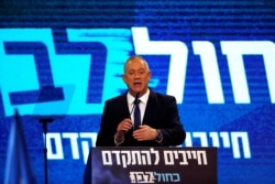 Blue and White party leader Benny Gantz speaks to supporters following the announcement of exit polls in Israel's election at the party's headquarters in Tel Aviv, Israel, March 3, 2020.