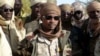 FILE - The son of Chad's late president Idriss Deby, Mahamat Idriss Deby Itno (also known as Mahamat Kaka) and Chadian army officers gather in the northeastern town of Kidal, Mali, Feb. 7, 2013.