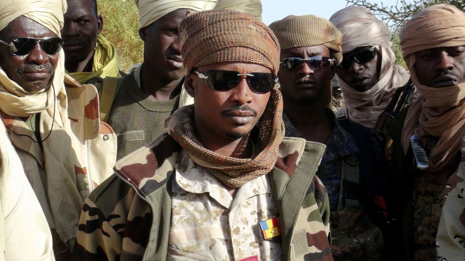 FILE - The son of Chad's late president Idriss Deby, Mahamat Idriss Deby Itno (also known as Mahamat Kaka) and Chadian army officers gather in the northeastern town of Kidal, Mali, Feb. 7, 2013.