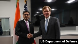 Under Secretary of Defense Elbridge A. Colby greet Indian Foreign Secretary Vikram Misri at the Pentagon, Washington, D.C., May 29, 2025. 