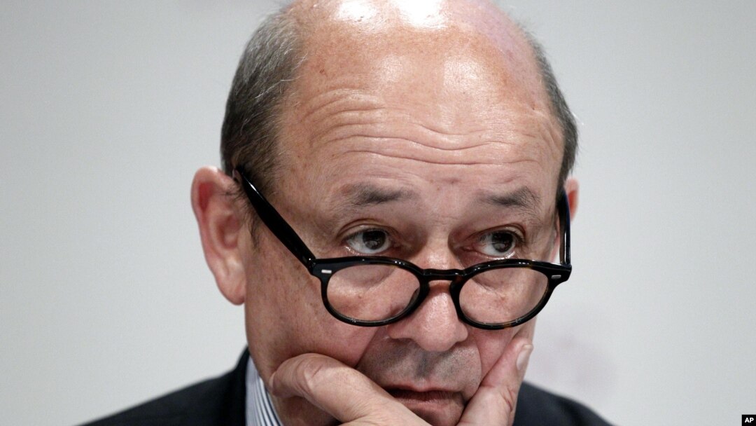 French Defense Minister Jean-Yves Le Drian listens to a speech at the Institute for Strategic Studies (IISS) Shangri-la Security Summit, in Singapore, June 3, 2012. 
