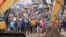 FILE—Residents watch as excavators and bulldozers bring down their homes in the Mathare area of Nairobi, May 8, 2024. 