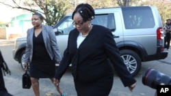 FILE: Zimbabwe Electoral Commission chairperson Priscilla Chigumba arrives at the Constitutional Court in Harare, Wednesday, Aug, 22, 2018. (AP Photo/Tsvangirayi Mukwazhi)