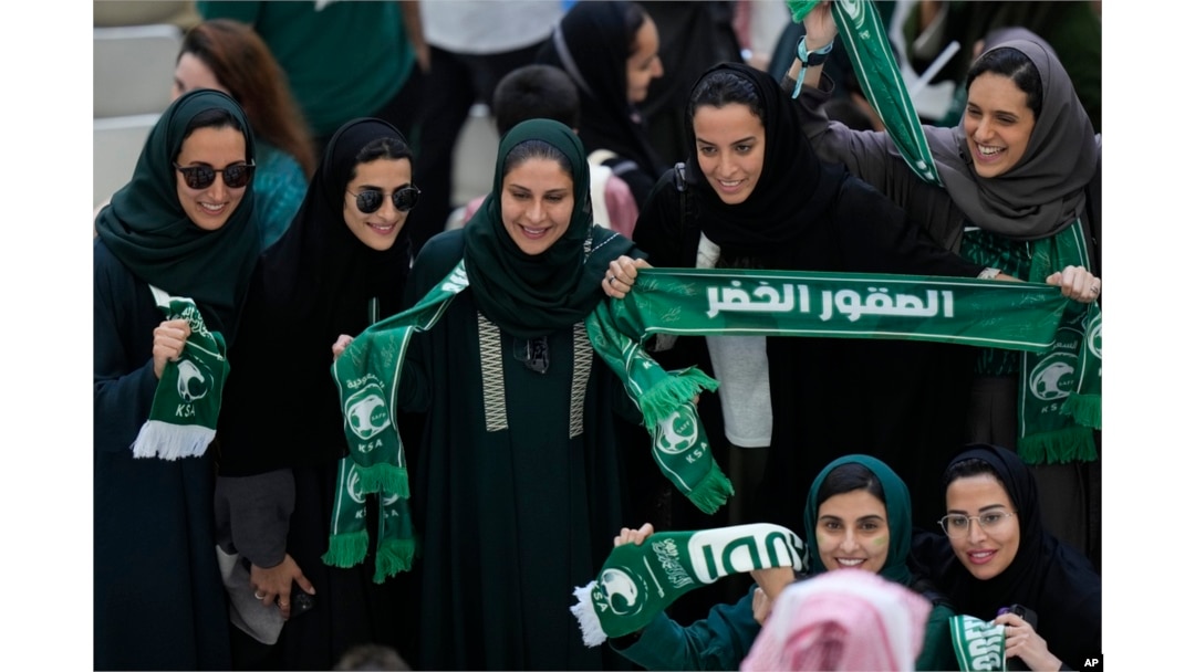FILE - Saudi women supporters celebrate after Saudi Arabia won the World Cup group C soccer match between Argentina and Saudi Arabia at the Lusail Stadium in Lusail, Qatar, on Nov. 22, 2022.