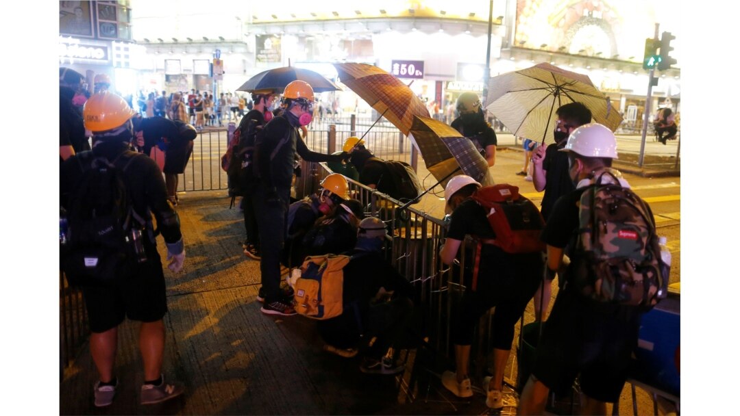 Anti-extradition bill protesters set up a roadblock at Tsim Sha Tsui neighborhood in Hong Kong, Aug. 10, 2019.