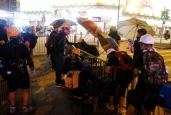Anti-extradition bill protesters set up a roadblock at Tsim Sha Tsui neighborhood in Hong Kong, Aug. 10, 2019.