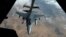 Дозаправка у повітрі американського винищувача F-16 під час операції над Іраком і Сирією, 15 березня 2017 року. Reuters/ Hamad I Mohammmed