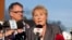 Quebec Premier Pauline Marois (foreground) speaks to reporters in Lac Megantic in this July 6, 2013, file photo.