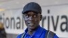 Marathon runner Guor Mading Maker (formerly Guor Marial) arrives at Heathrow Airport for the London 2012 Olympic Games, August 3, 2012. Maker's dream to run for South Sudan at the 2016 games in Rio de Janeiro suffered a blow this month when the South Sudan Athletics Federation suspended him.