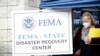 People gather at a FEMA Disaster Recovery Center at A.C. Reynolds High School in Asheville, North Carolina, Oct. 15, 2024