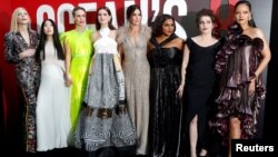 FILE - Cast members, left to right, Cate Blanchett, Awkwafina, Sarah Paulson, Anne Hathaway, Sandra Bullock, Mindy Kaling, Helena Bonham Carter and Rihanna pose at the world premiere of the film "Ocean's 8" at Alice Tully Hall in New York City, New York, 