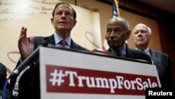 FILE - U.S. Senator Richard Blumenthal, from left, (D-CT), House Judiciary Committee member John Conyers, Jr. (D-MI) and Senator Pat Leahy (R) hold a press conference to outline the claim that U.S. President Donald Trump violated the emoluments clause of the Constitution.
