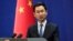 FILE - Chinese Foreign Ministry spokesman Geng Shuang speaks during a daily briefing at the Ministry of Foreign Affairs office in Beijing, Jan. 29, 2019.