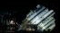 FILE - The capsized cruise liner Costa Concordia lies on its side during the "parbuckling" operation next to Giglio Island. Sept. 16, 2013.