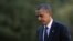 President Barack Obama walks from Marine One on the South Lawn of the White House, Washington, Sept. 13, 2012.