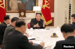 North Korean leader Kim Jong Un presides over a meeting of the Presidium in Pyongyang, North Korea, May 17, 2022. Photo by Korean Central News Agency via Reuters.