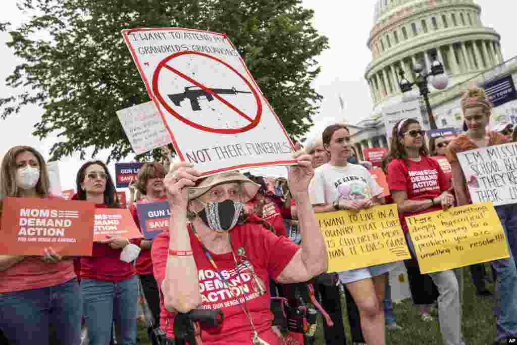 Activists join Senate Democrats outside the Capitol in Washington, to demand action on gun control legislation after a gunman killed 19 children and two teachers in a Texas elementary school this week.