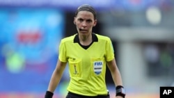 FILE - Referee Stéphanie Frappart of France during the of the Women's World Cup quarterfinal soccer match between Germany and Sweden at Roazhon Park in Rennes, France, June 29, 2019.