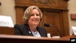 FILE - Human Rights Campaign legal director Sarah Warbelow testifies on the Equality Act before a U.S. House subcommittee in the Rayburn House Office Building, April 9, 2019, in Washington.