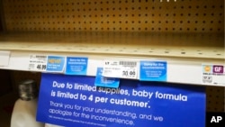A due to limited supplies sign is shown on the baby formula shelf at a grocery store May 10, 2022, in Salt Lake City. 