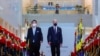 U.S. President Joe Biden and South Korean President Yoon Suk-youl are greeted by a guard of honour as they gather at a State Dinner at the National Museum of Korea in Seoul, South Korea, May 21, 2022. 