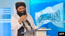FILE - Taliban Interior Minister Sirajuddin Haqqani, speaking in Kabul on April 28, 2022, still carries a $10 million bounty from the U.S. government for his arrest relating to a fatal attack on a hotel in 2008. 