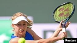 Though she was born in Russia, tennis player Daria Saville wore the colors of Ukraine during the BNP Paribas Open at the Indian Wells Tennis Garden in California. Photo Credit: Jayne Kamin-Oncea-USA TODAY Sports.