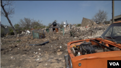 Banesat e shkatërruara nga goditjet e artilerisë ruse në Kamianske, në jug të Ukrainës