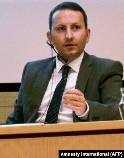 This handout photo released by NGO Amnesty International on May 19, 2022, shows Ahmadreza Djalali, an Iranian-Swedish citizen, at an undisclosed location.