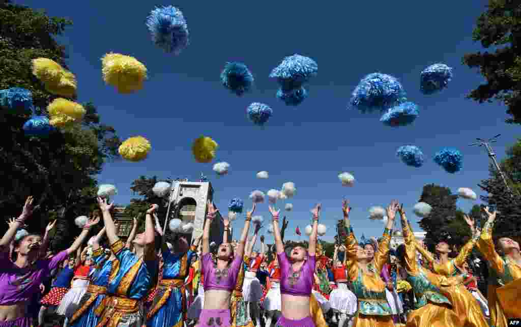 Children attend the celebrations marking the International Children&#39;s Day in central Bishkek, Kazakhstan.