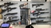 FILE - Firearms are displayed at a gun shop in Salem, Oregon, Feb. 19, 2021.