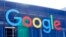 FILE: In this 9.24.2019 photo a sign is shown on a Google building at their campus in Mountain View, Calif. 