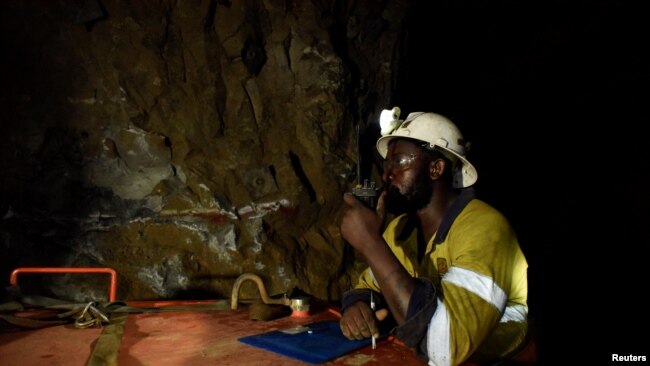 A man works during a rescue operation inside a Perkoa mine where water is still being pumped out, four weeks after a flood trapped eight miners inside the galleries, in Perkoa, Burkina Faso, May 13, 2022.