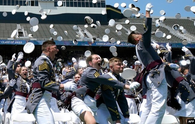 Class of 2022 cadets celebrate their graduation during commencement ceremonies at the US Military Academy West Point, May 21, 2022, in New York. (Photo by TIMOTHY A. CLARY / AFP)