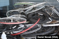 Wheels from donated bikes at Phoenix Bikes in Arlington, Virginia. All of the bikes the students fix are donated from the community. (Dan Novak/VOA)