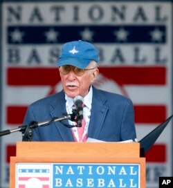 FILE - Roger Angell, of The New Yorker, speaks after receiving the J.G. Taylor Spink Award during a ceremony at Doubleday Field at the National Baseball Hall of Fame on July 26, 2014, in Cooperstown, NY.