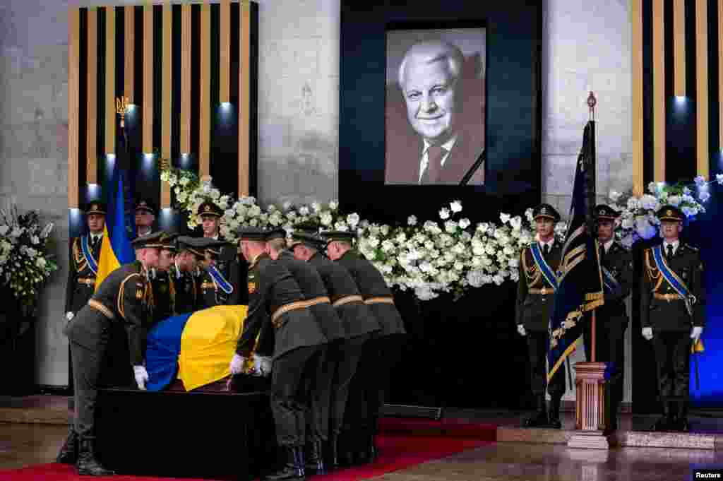 Members of Honor Guard carry the coffin of the first president of Ukraine Leonid Kravchuk during his funeral ceremony, in Kyiv, Ukraine.