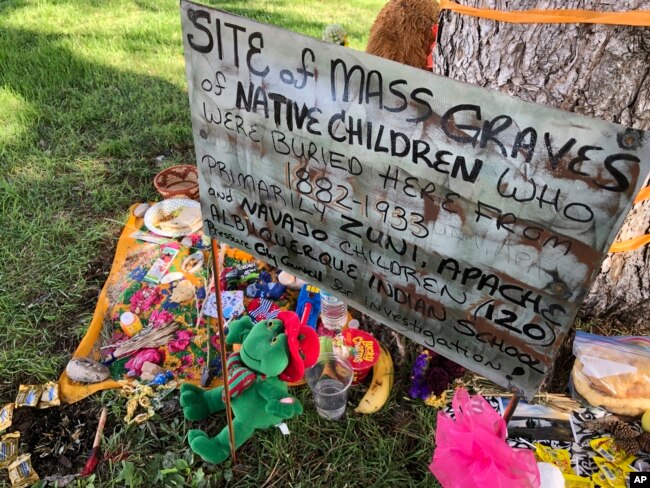 A makeshift memorial for the dozens of Indigenous children who died more than a century ago while attending a boarding school in New Mexico. (AP Photo/Susan Montoya Bryan, File)