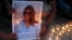 FILE - Family and friends of Al Jazeera reporter Shireen Abu Akleh attend a candlelight vigil outside the Church of the Nativity in the West Bank biblical city of Bethlehem, May 16, 2022.