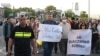 Demonstrators hold a rally in protection of independent media in Tbilisi, May 18, 2022, after Nika Gvaramia, an anchor and owner of the pro-opposition Mtavari TV, was sentenced to three-and-a-half years behind bars. 