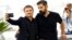 Romanian filmmaker Cristian Mungiu, left, and cast member Marin Grigore take a selfie as they pose at the 75th Cannes Film Festival, in Cannes, France, May 22, 2022. 