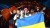 Grup musik "Kalush Orchestra" dari Ukraina yang memenangkan Eurovision tahun ini di Torino, Italia (14/5). 