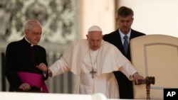 Pope Francis arrives in St. Peter's Square on the occasion of the weekly general audience at the Vatican, May 18, 2022.