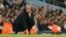 Mai horar da 'yan wasan Manchester City, Pep Guardiola (AP)